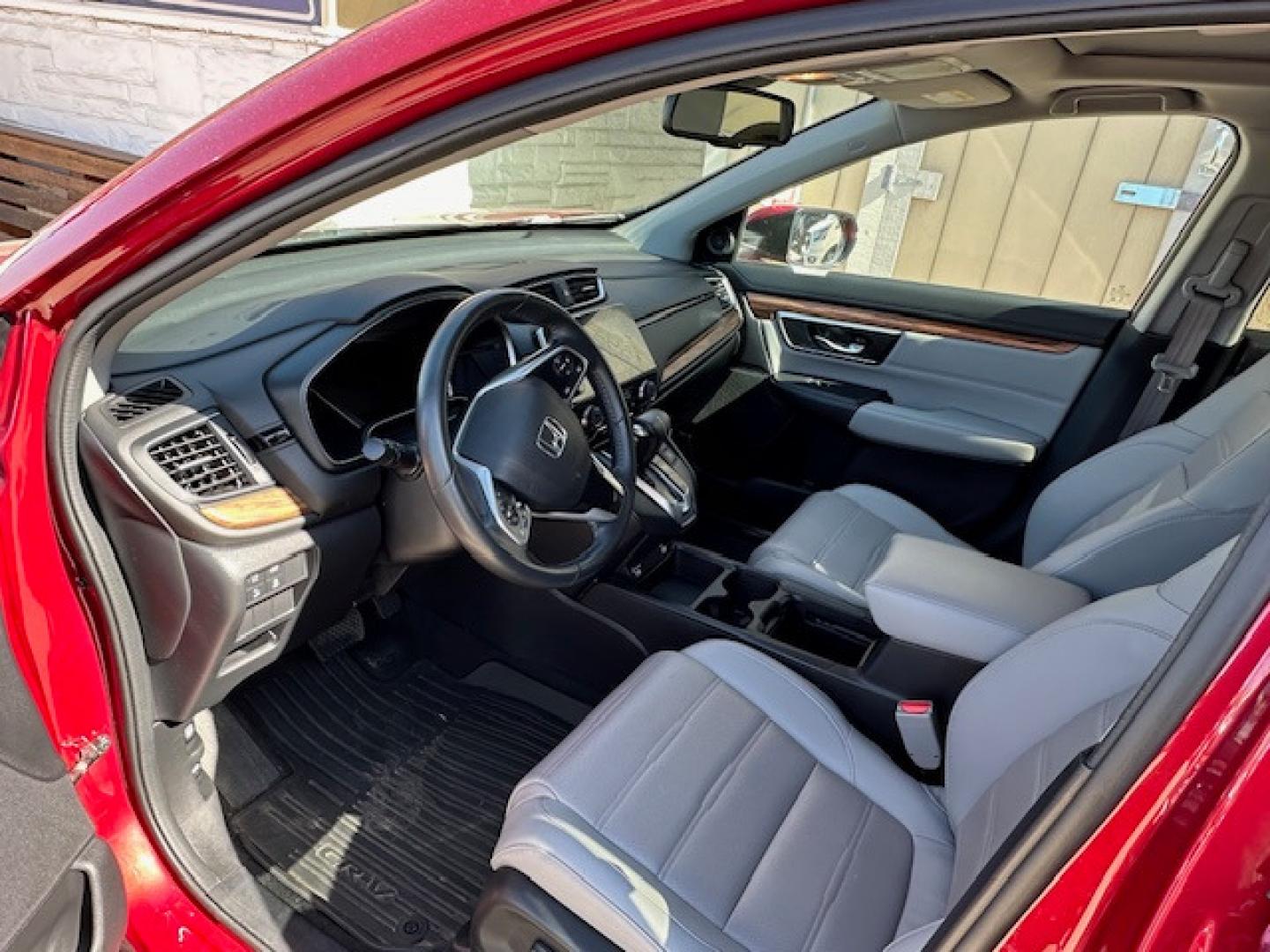 2020 Red /Gray Leather Honda CR-V EX-L AWD (5J6RW2H89LA) with an 1.5L L4 16V DOHC TURBO engine, CVT transmission, located at 3200 1st Avenue North, Billings, MT, 59101, (406) 245-9055, 45.779270, -108.510742 - Super Sharp Off Leased SUV. EX-L Package with Power Moon Roof, Leather Interior, Power Seats, Upgraded Sound System, Never Smoked In and Only 30,000 Miles! CarFax Dealer. Auto Brokers of Montana/AA&A Auto Rental/Fox Car Rental Billings - Photo#2